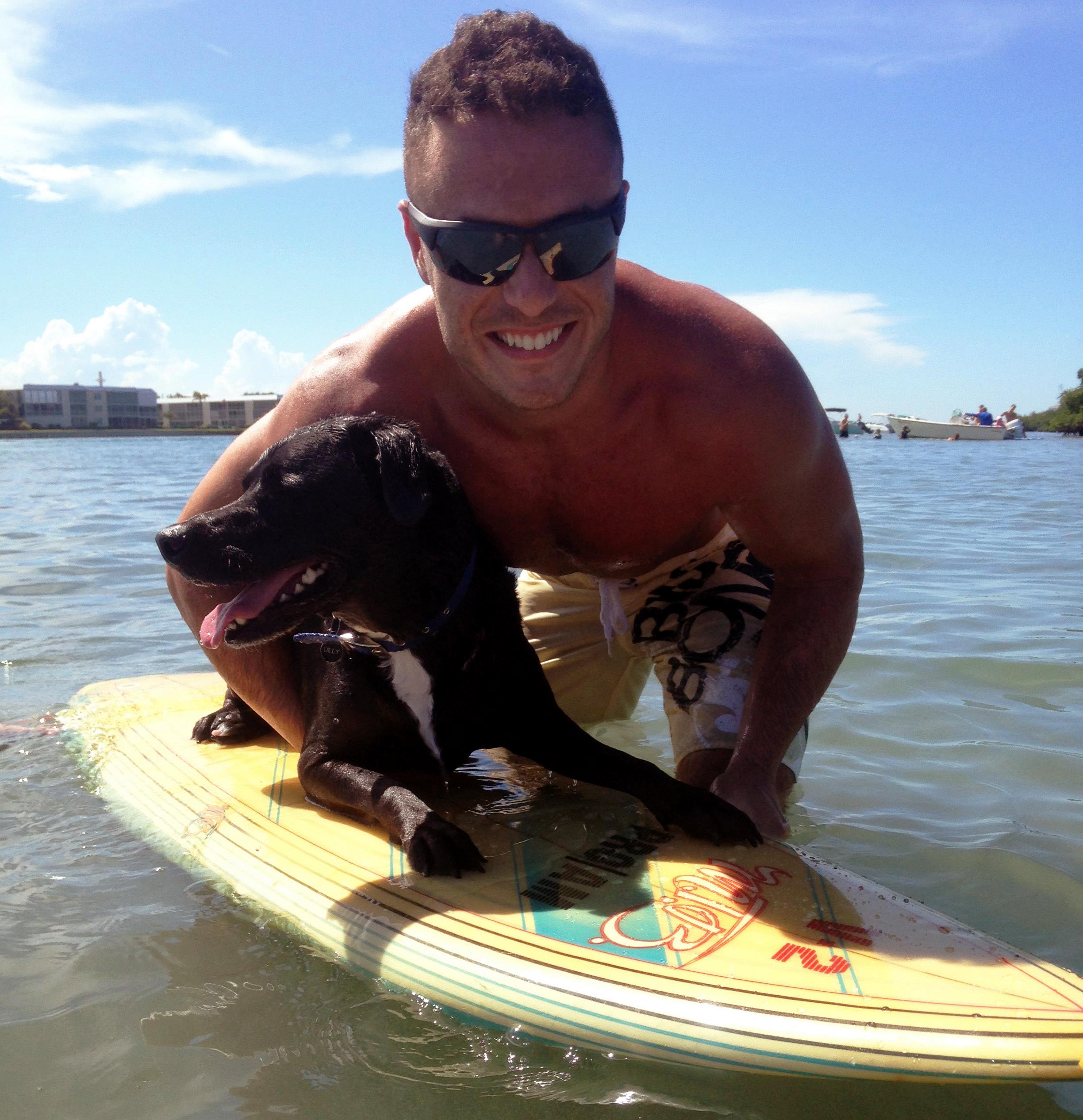 Clint Warren dog surfing